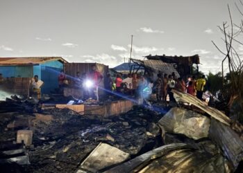 Fire ravages Asoprochona Railway slum, leaving hundreds homeless